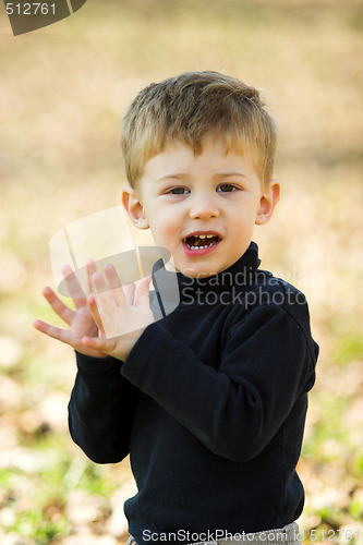 Image of boy clapping