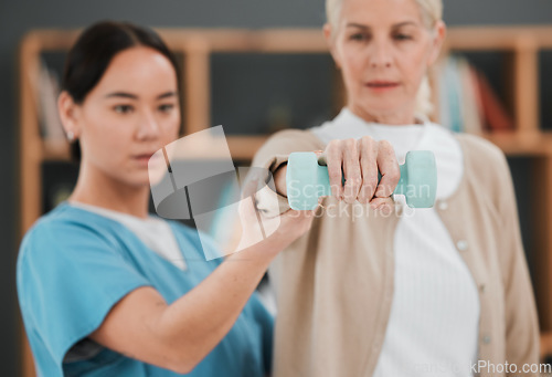 Image of Patient hand, dumbbell and physiotherapy rehabilitation nurse help for fitness, muscle and support. Healthcare physiotherapist woman with elderly person for physical therapy and stretching exercise