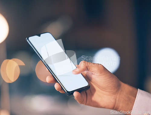 Image of Smartphone, mockup screen and hand of woman for internet, social media and networking online at night. Communication, office and worker with blank phone for mobile app, branding and website logo