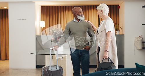 Image of Travel, communication and business people holding hands for partnership, professional teamwork and executive work with luggage. Support, smile and diversity of couple of employees talking at a hotel