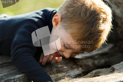 Image of boy searching in the park