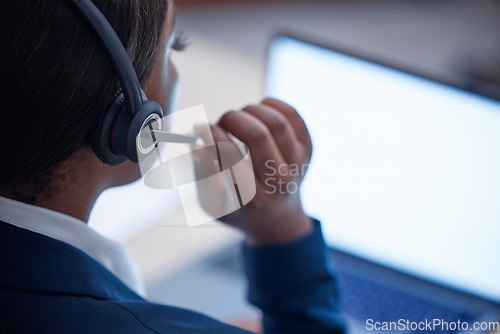 Image of Woman, call center and laptop in night with microphone, talk and tech support in office at help desk. Crm expert, customer service and communication with computer, consulting and advice with voip