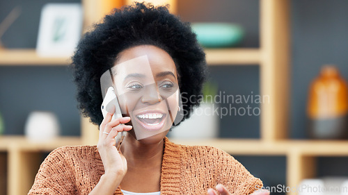 Image of Business woman answering her phone, smiling, laughing and chatting in the office. Happy female designer making a phonecall to a customer, client or colleague to discuss and brainstorm creative ideas