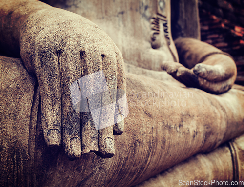 Image of Buddha statue hand close up detail