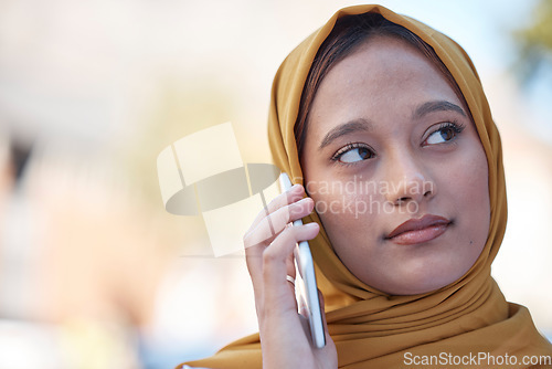 Image of Muslim woman in city on a phone call, cellphone communication or 5g International update, news or conversation. Young islamic, Urban outdoor hijab or Saudi Arabia person talking on mobile smartphone