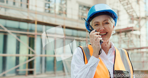 Image of Engineering, construction site and woman in communication on a walkie talkie building a development project outside. Smile, contractor and happy senior manager talking or speaking on safety on radio
