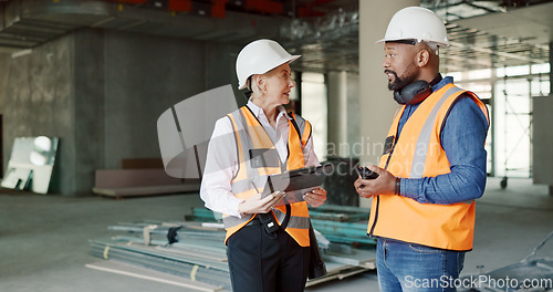 Image of Construction, inspection and clipboard, black man and woman discussion, construction site with scaffolding and building renovation checklist. Contractor with inspector, engineering and communication.