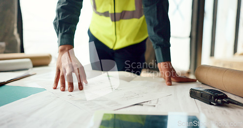 Image of Hands of architect check blueprint at construction site for building, house or real estate industrial development. Architecture industry man, engineer and contractor inspection of project design plan