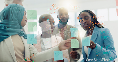 Image of Meeting, planning and sticky notes on glass in the office with a diversity business team planning strategy. Teamwork, collaboration and coaching with a black woman leader teaching her staff at work