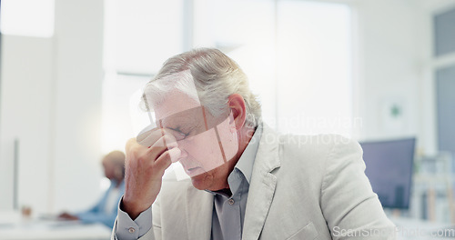 Image of Business man, stress and reading paperwork or documents while thinking and working in a office while tired and burnout at a desk. Senior executive holding a paper for budget, report or audit