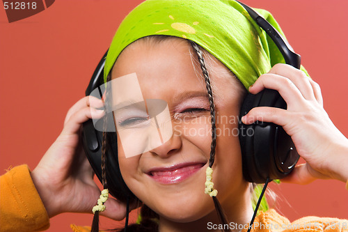 Image of child listening music