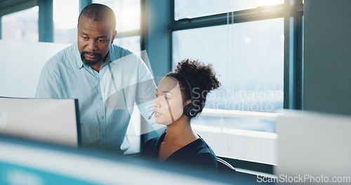 Image of Call center, black man and training woman, telemarketing intern and crm customer service consultant on computer software in office agency. Business people, sales mentor and coaching for tech solution