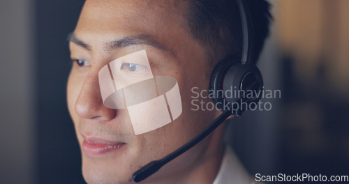 Image of Call center, consultant and man with face and contact us, phone call zoom with communication and headset. Telemarketing, customer service or tech support, speaking to client and Asian agent help desk