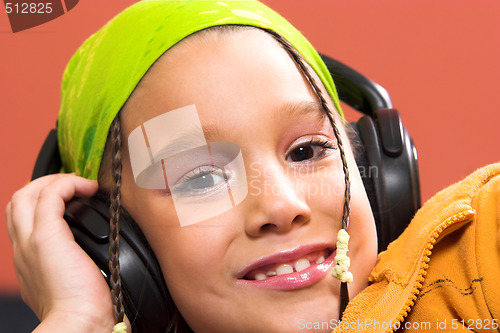 Image of child listening music