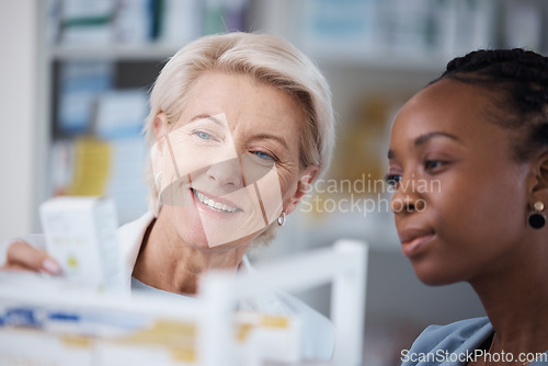 Image of Pharmacist, healthcare and black woman with medicine, shopping and conversation for instructions, information and smile. Pharmacy, female customer and medical professional with pills and discussion