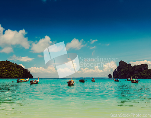 Image of Long tail boats in bay. Thailand