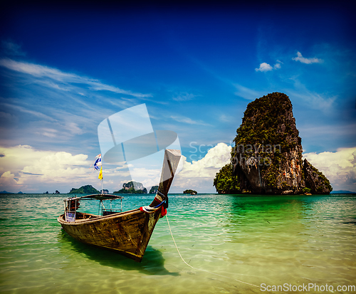 Image of Long tail boat on beach, Thailand