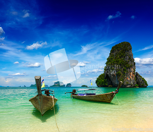 Image of Long tail boats on beach, Thailand