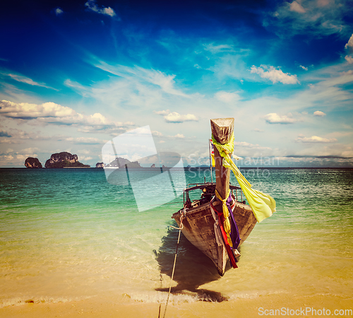 Image of Long tail boat on beach, Thailand