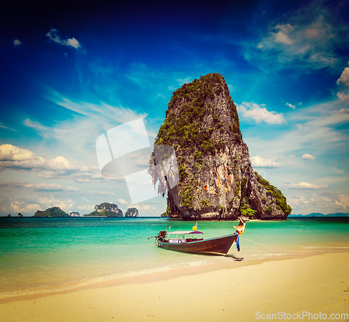 Image of Long tail boat on beach, Thailand