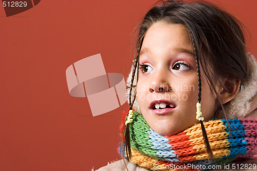 Image of child with coat and scarf