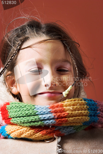 Image of child with coat and scarf
