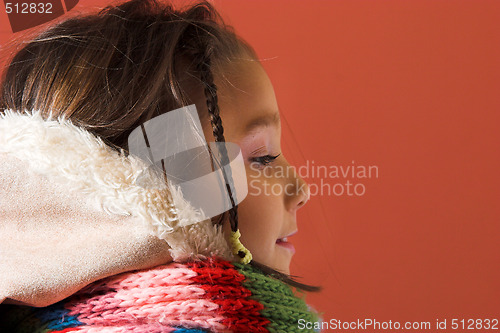 Image of child with coat and scarf