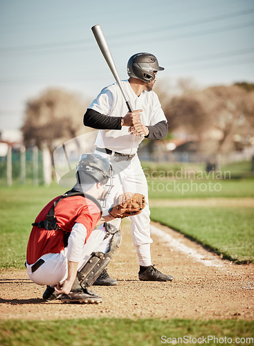Image of Baseball, bat and focus with a sports man outdoor, playing a competitive game during summer. Fitness, health and exercise with a male athlete or player training on a field for sport or recreation