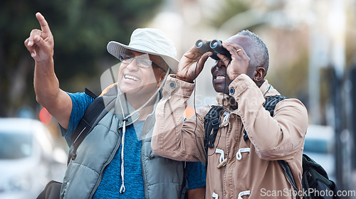 Image of Binoculars, city and men travel outdoor of discovery, explore vacation or tourist adventure walk. Happy friends, tourism and sightseeing search in sky, lens or journey direction of holiday experience