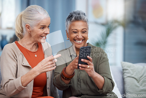 Image of Elderly women, phone social media and living room with senior females with mobile connectivity. Video streaming, happiness and conversation at a house with old people together on technology at home