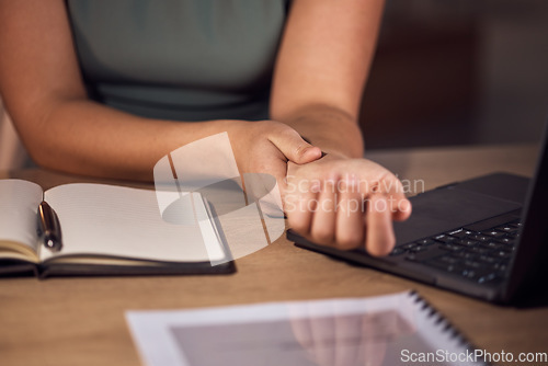 Image of Carpal tunnel, pain and business woman at desk working with wrist massage, arthritis or muscle check. Worker or professional person hands closeup in medical injury from typing or writing on computer