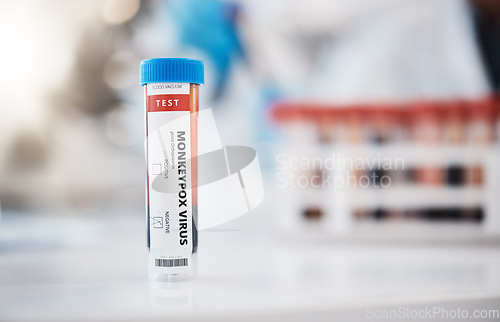 Image of Healthcare, blood and monkeypox sample in a lab for research, innovation or the development of a cure. Medical, dna and vaccine with a vial of bloodwork in a laboratory for study or examination