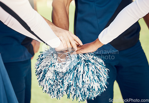 Image of Cheerleader, sports motivation or hands in huddle with support, hope or faith on field in game. Team spirit, cheerleading or zoom of cheerleaders with pride, goals or solidarity together with pompom