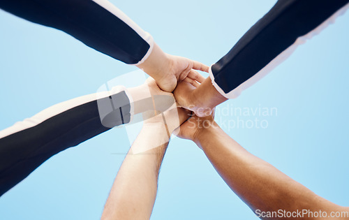 Image of Cheerleaders, sports motivation or hands in huddle with support, hope or faith on field in game. Team spirit, blue sky or cheerleading group with inspiration, goals mission or solidarity together