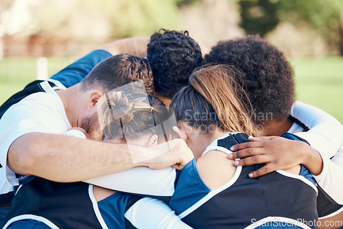 Image of Cheerleaders, sports teamwork or people in huddle with support, hope or faith on field in game together. Mission, strategy or group of cheerleading young athlete with motivation, goals or solidarity