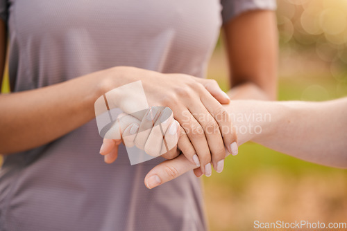 Image of Hands, trust and support with friends outdoor together in a show of unity, solidarity or comfort. Love, empathy and care with a female comforting or consoling a friend outside for compassion