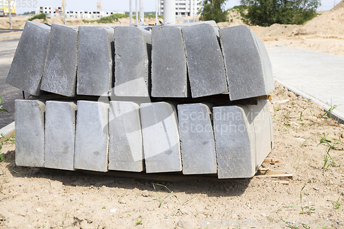 Image of large and long concrete curbs