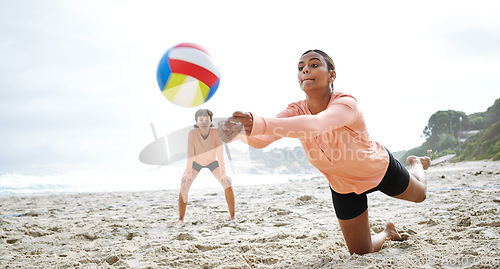 Image of Volleyball, sports and teamwork of women at beach hitting ball in competition, game or match mockup. Training, exercise and girls, players or friends play for workout, fitness and health at seashore.