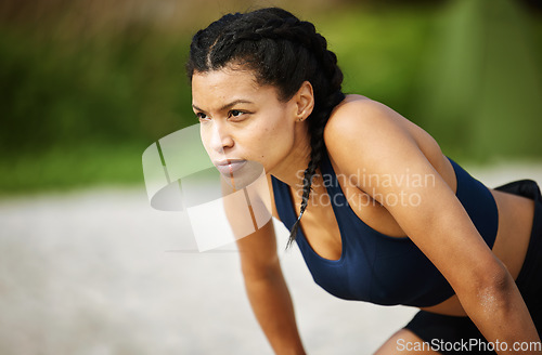 Image of Beach, fitness and focus with a woman runner breathing while outdoor for cardio or endurance training. Exercise, tired or rest and a female athlete taking a break from running on the sand with mockup