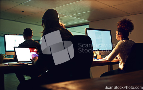 Image of Computer, coworking team or night people programming ERP software, cybersecurity system or online server code. Startup data center, ai developer or back of programmer coding machine learning database