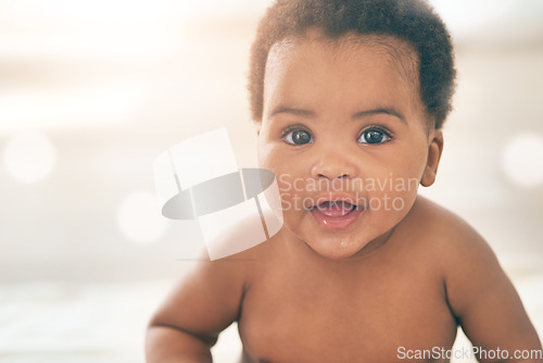 Image of Cute baby, black kid and happy portrait with bokeh, mockup and space in nursery room, happiness and relax. Young infant child, girl and smile of healthy development, growth and adorable face in house