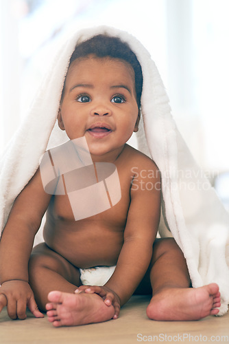 Image of Adorable baby, black kid and blanket for play, fun and newborn on nursery room floor, happiness and relax. Happy young infant child, girl and body of healthy development, growth and nurture in house