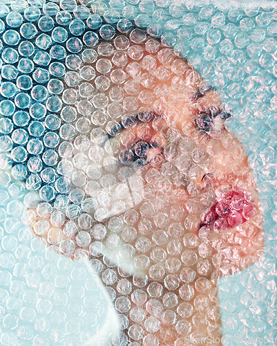 Image of Beauty, bubble wrap and makeup with portrait of black woman for package, creative and cosmetics. Plastic, confidence and glow with girl model and red lipstick for facial, art and glow in studio