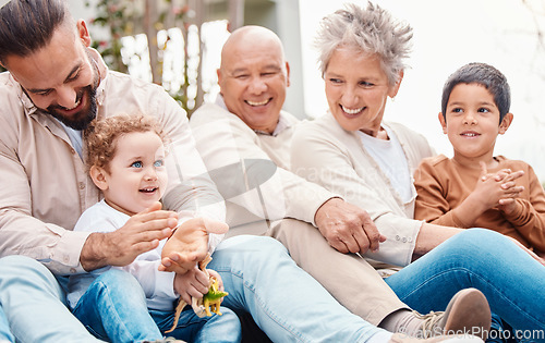 Image of Bonding, happy and family laughing during a visit for love, care and happiness. Playing, interracial and grandparents, children and father in a garden for quality time, playful and cheerful together