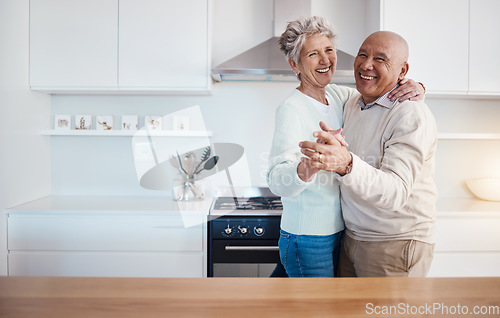 Image of Love, dance and portrait of old couple in kitchen at home, weekend time and celebrate romance with smile. Retirement, happiness and health, happy man and senior woman dancing in house or apartment.