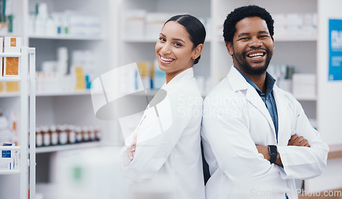 Image of Pharmacists, teamwork and arms crossed in portrait, medicine trust or about us healthcare in medical drugstore collaboration. Smile, happy and confident pharmacy people in retail consulting or help