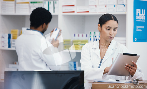 Image of Pharmacist, worker or digital tablet for medicine check, stock take or medical research in drugs store. Smile, happy or pharmacy woman on technology for pills, checklist or ecommerce healthcare order