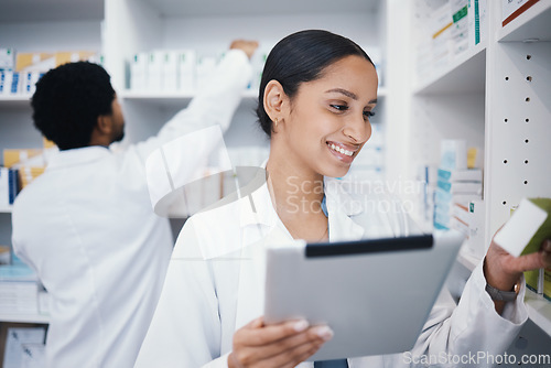 Image of Pharmacist, woman or digital tablet for medicine check, stock take or medical research in drugs store. Smile, happy or pharmacy worker on technology for pills, checklist or ecommerce healthcare order