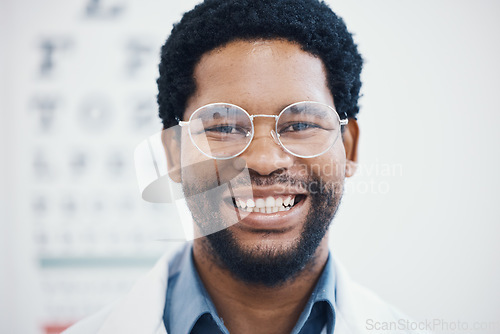 Image of Optician, portrait or glasses for eyes care, healthcare wellness or optometry help in retail store or optometry shop. Zoom, happy or black man with eyecare, eyewear lens or prescription vision frame