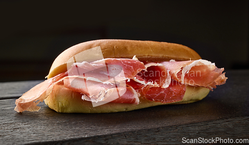 Image of sandwich with sliced spanish iberico ham
